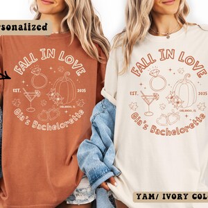 Matching fall bachelorette shirts in contrasting colors for bride and bridesmaids, with pumpkins, flowers, hearts, and engagement ring design.