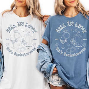 Bride and maid of honor in contrasting fall bachelorette shirts with personalized floral pumpkin design, ideal for autumn wedding parties.