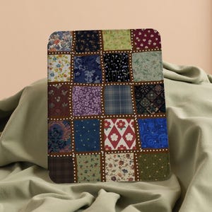 May include: A rectangular patchwork design featuring a variety of floral and patterned fabrics in squares. The squares are bordered with brown and white dotted lines. The color palette includes blues, greens, reds, and purples.