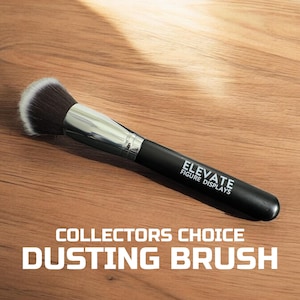 May include: A black dusting brush with white bristles and the text "Elevate Figure Displays" on the handle.  Collectors Choice Dusting Brush.