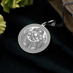 Achilles and Patroclus pendant necklace featuring classical mythological relief artwork