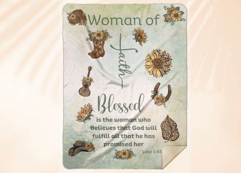 May include: A green and white throw blanket with a floral design and the text "Woman of Faith Blessed is the woman who Believes that God will fulfill all that he has promised her Luke 1:45".