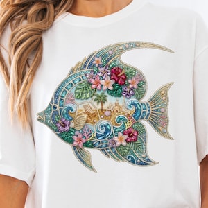 A vibrant digital design of a tropical fish decorated with a faux rhinestone and gemstone texture. The fish features a miniature tropical beach scene with a palm tree, beach chair, and waves, accented by pink hibiscus flowers. Intended for crafts, sublimation and DTF printing.