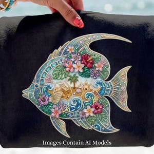 A vibrant digital design of a tropical fish decorated with a faux rhinestone and gemstone texture. The fish features a miniature tropical beach scene with a palm tree, beach chair, and waves, accented by pink hibiscus flowers. Intended for crafts, sublimation and DTF printing.