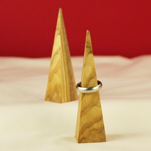Wedding Ring Display Stand Handcrafted Wood Design Triangle Shape Holder Walnut Construction Modern Jewelry Storage Solution Minimalist Vanity Accessory Wedding Ring Display Beautiful Wedding Gift Essential Clear Lacquer Finish Natural Wood