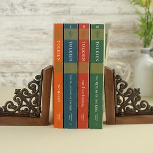 Classic Metal Bookend Set Victorian Inspired Design Cast Iron Construction Walnut Base Premium Book Support Elegant Office Organization Professional Library Display Beautiful Scroll Pattern Vintage Style Collection Sophisticated Home Accent