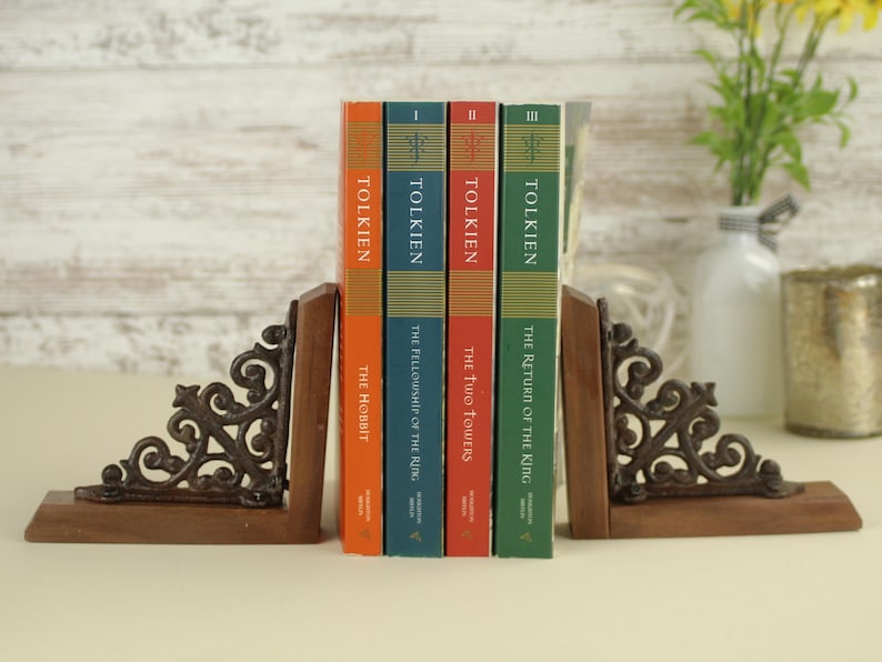 Classic Metal Bookend Set Victorian Inspired Design Cast Iron Construction Walnut Base Premium Book Support Elegant Office Organization Professional Library Display Beautiful Scroll Pattern Vintage Style Collection Sophisticated Home Accent