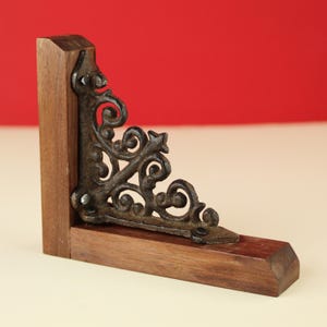 Cast Iron Bookend Set Victorian Style Design Black Metal Scroll Pattern Walnut Wood Base Library Organization Essential Vintage Inspired Office Desk Accessory Professional Book Display Classic Home Accent Elegant Shelf Support Beautiful
