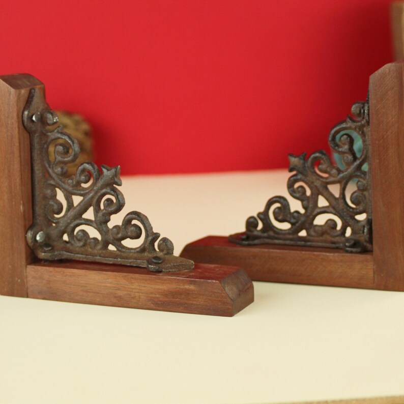 Cast Iron Bookend Set Victorian Style Design Black Metal Scroll Pattern Walnut Wood Base Library Organization Essential Vintage Inspired Office Desk Accessory Professional Book Display Classic Home Accent Elegant Shelf Support Beautiful