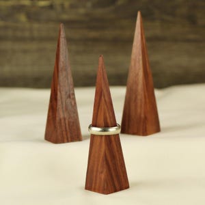 Wedding Ring Display Stand Handcrafted Wood Design Triangle Shape Holder Walnut Construction Modern Jewelry Storage Solution Minimalist Vanity Accessory Wedding Ring Display Beautiful Wedding Gift Essential Clear Lacquer Finish Natural Wood