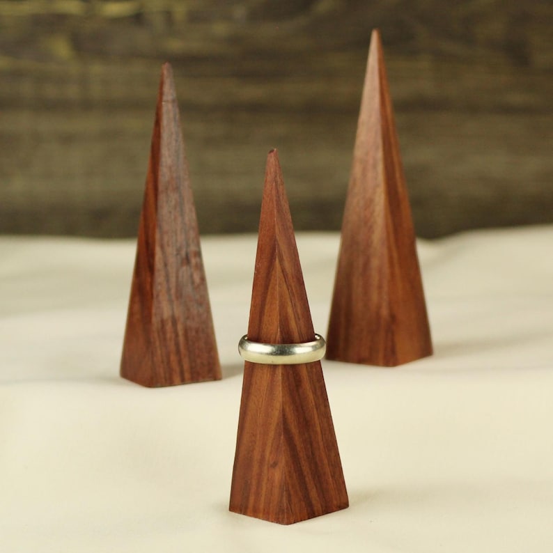 Wedding Ring Display Stand Handcrafted Wood Design Triangle Shape Holder Walnut Construction Modern Jewelry Storage Solution Minimalist Vanity Accessory Wedding Ring Display Beautiful Wedding Gift Essential Clear Lacquer Finish Natural Wood