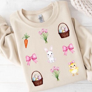 Coquete cestas de páscoa arcos e coelho png,coquete tulipas,cenouras pastel,coquete cesta,pintinho da páscoa png,feriado de abril png,caça aos ovos png