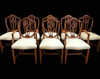 Stunningly beautiful exclusive Elite Prince of Wales style dining chairs professionally French polished and Upholstered.