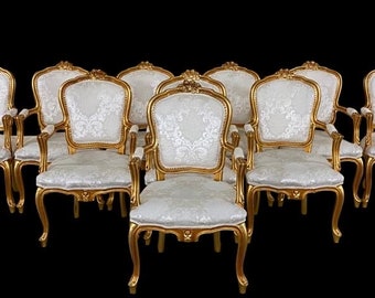 Stunningly beautiful exclusive Elite Louis palace style Gold dining chairs.