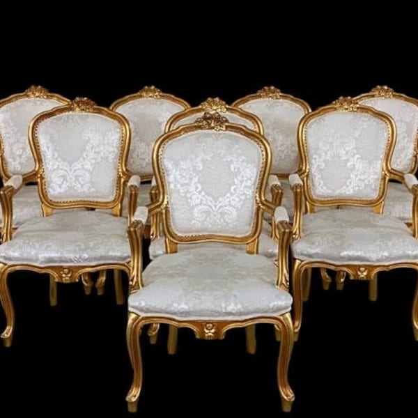 Stunningly beautiful exclusive Elite Louis palace style Gold dining chairs.