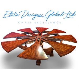 A truly magnificent Sunburst Flame mahogany Jupe extending circular Grand dining table professionally French polished.