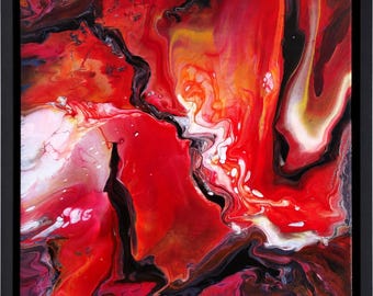 May include: A square abstract painting featuring fluid, marbled swirls of vibrant red, deep black, bright white, and hints of yellow. The composition is encased in a thin, black wooden frame, creating a high-contrast visual effect.