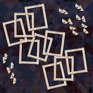 May include: A set of wooden weaving looms in various sizes, arranged in a random pattern on a dark blue and purple patterned background. The looms are made of natural wood and have a smooth finish. There are also several small wooden pieces in the shape of half circles scattered around the looms.