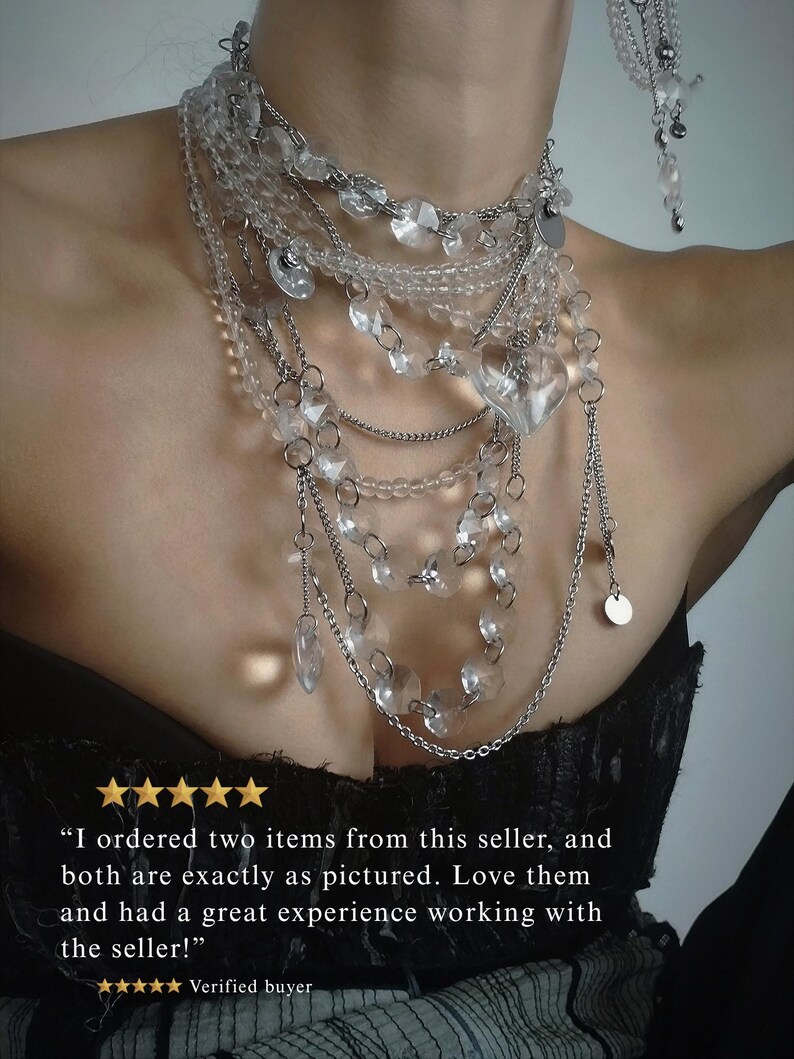 dramatic multi-strand clear quartz necklace on a model with large crystal heart pendants and stainless steel chains, featuring a 5-star customer review overlay confirming the jewelry is exactly as pictured and highlighting a great seller experience