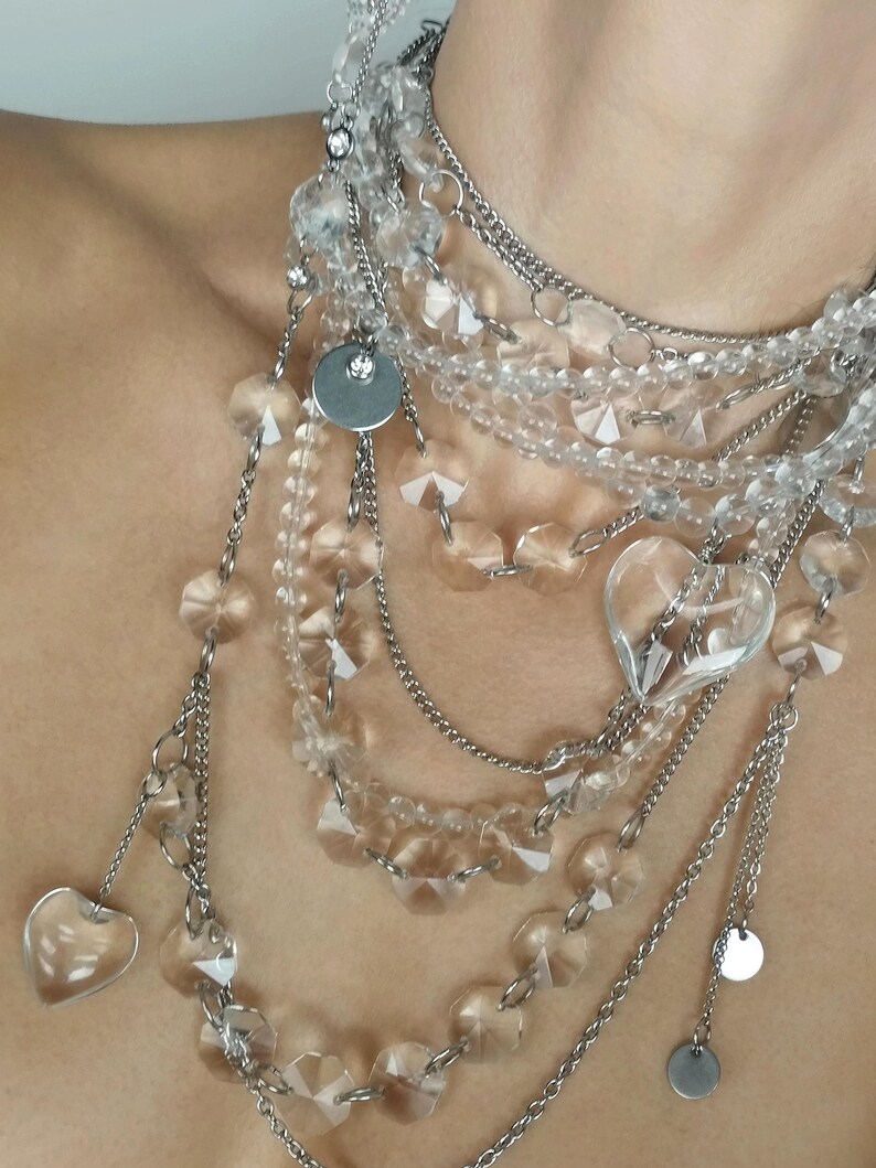 Stainless steel chain and layered quartz necklace featuring polished metal links and natural gemstone beads.
​