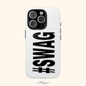 May include: A white phone case with a black "#SWAG" graphic. The case has a glossy finish and features a multi-lens camera system. The bottom of the case has the text "@Winged".