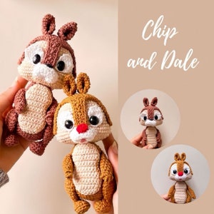 May include: Two crocheted stuffed animals, Chip and Dale, from Disney's Chip 'n Dale Rescue Rangers. Chip is brown and tan with a red nose and Dale is brown and tan with a white nose.