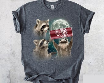 Camiseta gráfica de mapache genial, camiseta divertida para amantes de los animales, camiseta divertida de Dr Pepper