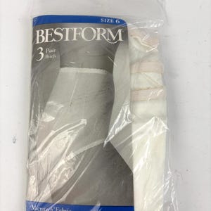 May include: A package of Bestform briefs, size 6, containing three pairs. The packaging is clear plastic, and the briefs are white. The package has a blue banner with the words "Microtech Fabric of 100% Captiva Nylon."
