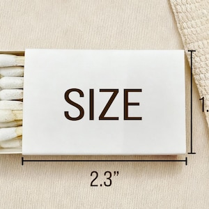 May include: A white matchbox with the word "SIZE" printed on the front. The box is 2.3 inches long and 1.4 inches wide. The box contains matches with white tips.