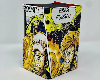 May include: A black and red deck box with a colorful comic book style design featuring characters from the anime One Piece. The box has the text "ROOM!!" and "GEAR FOUR!!" on it.
