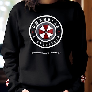 Umbrella Corporation - Unisex-Sweatshirt mit Ärmeldruck