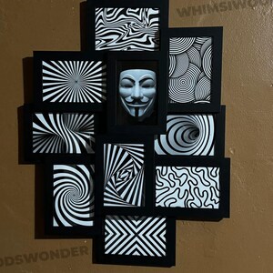 May include: A black picture frame collage with nine individual frames. Each frame contains a different black and white optical illusion design. The center frame features a white mask with a black design.