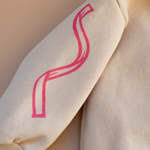 Hand Printed Pink Bow and Ribbon Block Print Baby/kids Beige Crewneck ...