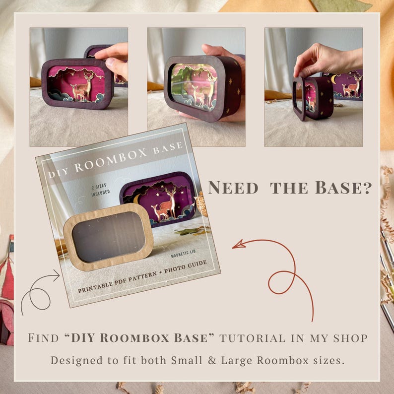 May include: A DIY roombox base kit featuring a dark brown rectangular frame with a magnetic lid. The kit includes a printable PDF pattern and photo guide for creating a miniature diorama with a deer scene. Text reads: DIY ROOMBOX BASE.