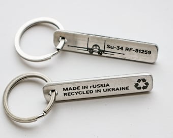 SU-34 Fighter Jet Remnant Keychain - A Meaningful Keepsake Commemorating Ukraine's Defiance