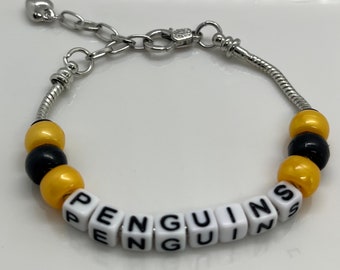 Pulsera de cuentas inspirada en pingüinos