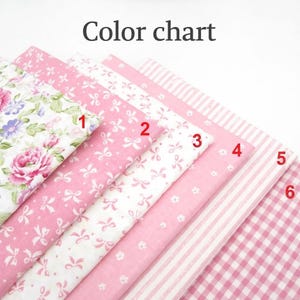 May include: A color chart featuring six fabric swatches labeled 1 through 6. The patterns include pink and purple floral, pink and white bows, white and pink bows, small white flowers on pink, pink and white stripes, and pink gingham.