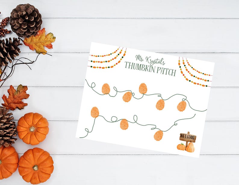 May include: A white paper with the text "Ms. Krystal's THUMBKIN PATCH" and pumpkin-shaped thumbprints. The design includes string lights with orange and green beads, and a small sign that says "WELCOME" with pumpkins. The image has a fall theme.
