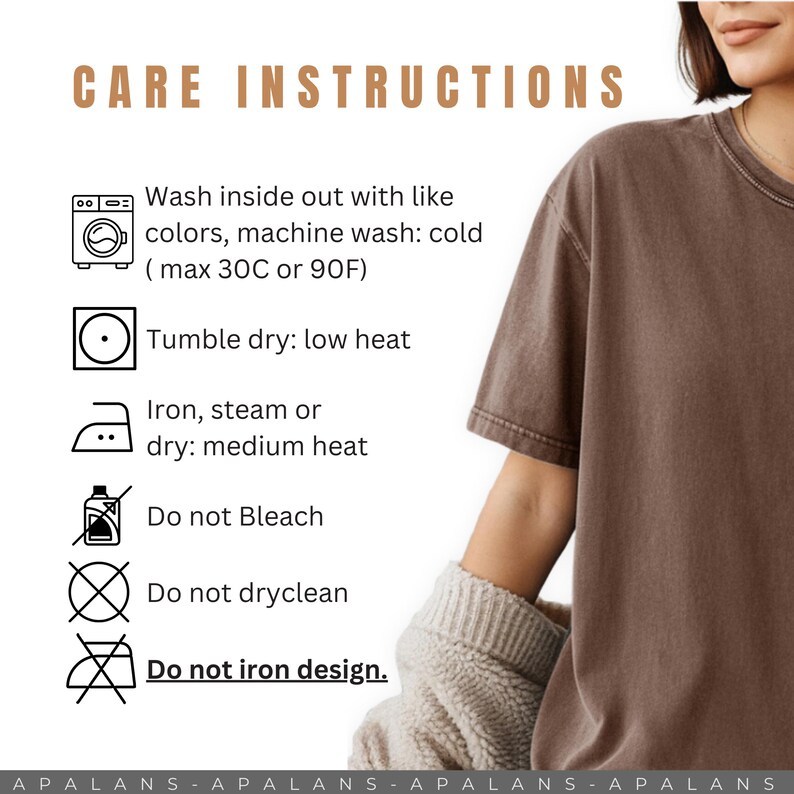 May include: A brown t-shirt with care instructions printed in a light brown font. The instructions include washing, drying, and ironing guidelines. The text reads "Wash inside out with like colors, machine wash: cold (max 30C or 90F)".