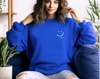 Bluza z haftowaną uśmiechniętą buźką: Happy Good Vibes z okrągłym dekoltem