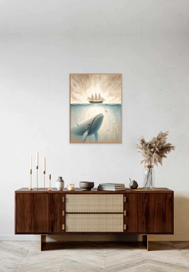 May include: A framed painting of a whale breaching the surface of the ocean, with a ship sailing above. The painting has a light blue, gray, and brown color scheme.
