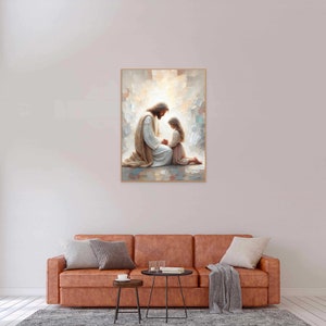 May include: A painting of a man in a white robe kneeling with a young girl in a white dress. The man is looking down at the girl, and the girl is looking up at the man. The background is a soft, light blue.