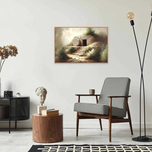 May include: A painting of a stone tomb with a large stone rolled away, revealing a dark doorway. The tomb is surrounded by green plants and a path leads up to the doorway. The painting is set against a light background.