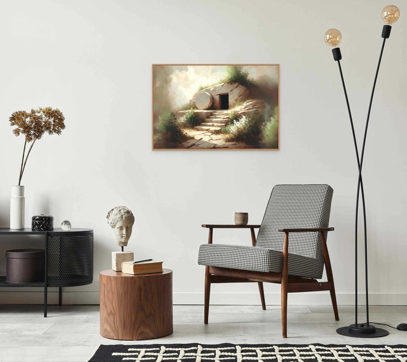 May include: A painting of a stone tomb with a large stone rolled away, revealing a dark doorway. The tomb is surrounded by green plants and a path leads up to the doorway. The painting is set against a light background.