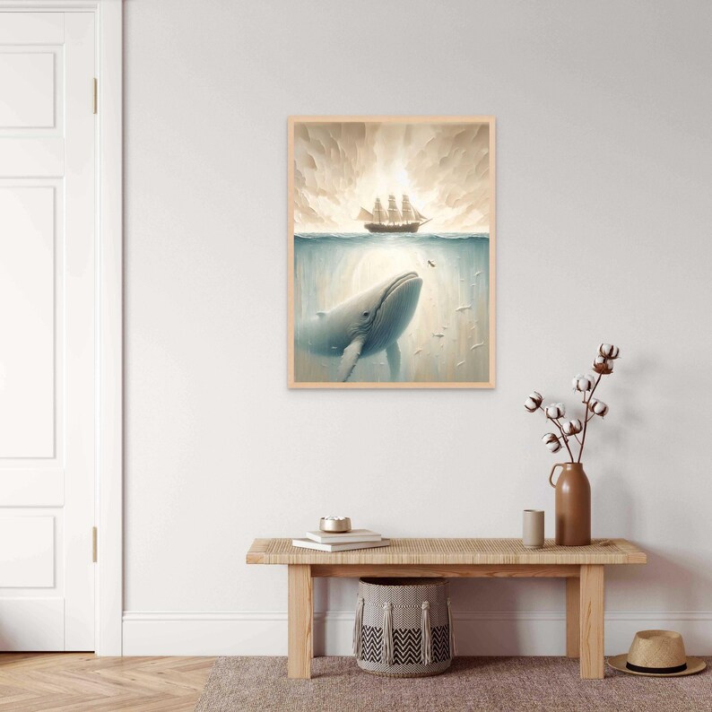 May include: A framed illustration of a whale looking up at a ship sailing on the surface of the water. The whale is light blue and the ship is brown with white sails. The background is a light blue sky with white clouds.