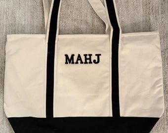 Mahjong Bag Large Black Canvas Bag with MAHJ Labeling. Dimensions of 15x21x5.5. 2 Pockets.