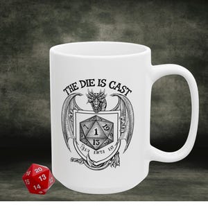 May include: A set of three ceramic mugs with a speckled, matte finish. The mugs are in shades of cream, light gray, and dark gray. Each mug has a simple, minimalist design, perfect for coffee or tea.