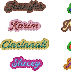 May include: Eight embroidered patches with names in various colours and fonts. The names are Jennifer, Julia, Karim, Meghan, Cincinnati, Carole, Stacey, and Rachel.