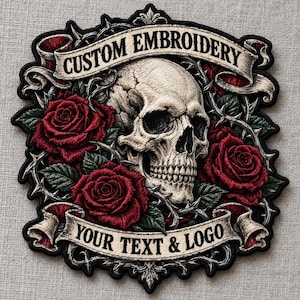 May include: A decorative embroidered patch featuring a central human skull surrounded by deep red roses and thorny vines. Two beige banners frame the design, with the top banner reading CUSTOM EMBROIDERY and the bottom banner reading YOUR TEXT & LOGO.
