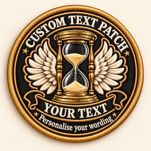 May include: A circular embroidered patch featuring a gold hourglass with wings on a black background. The text CUSTOM TEXT PATCH is arched at the top, with YOUR TEXT and Personalise your wording printed on a banner at the bottom with gold stars.